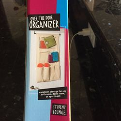 Brand New Over The Door Organizer. Excellent storage for any bathroom, dorm room, or apartment.