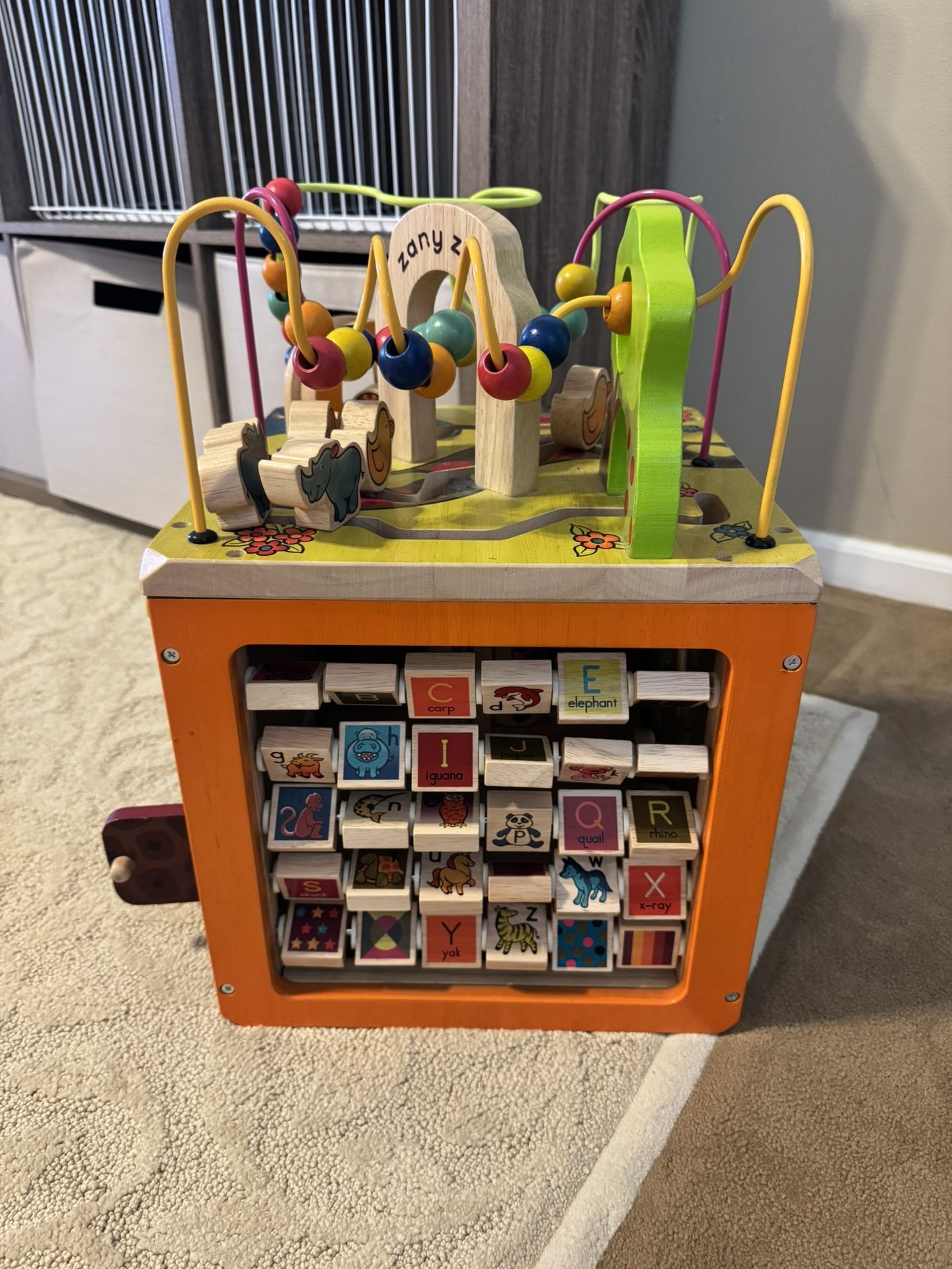 B. Toys Wooden Busy Box Maze Toy