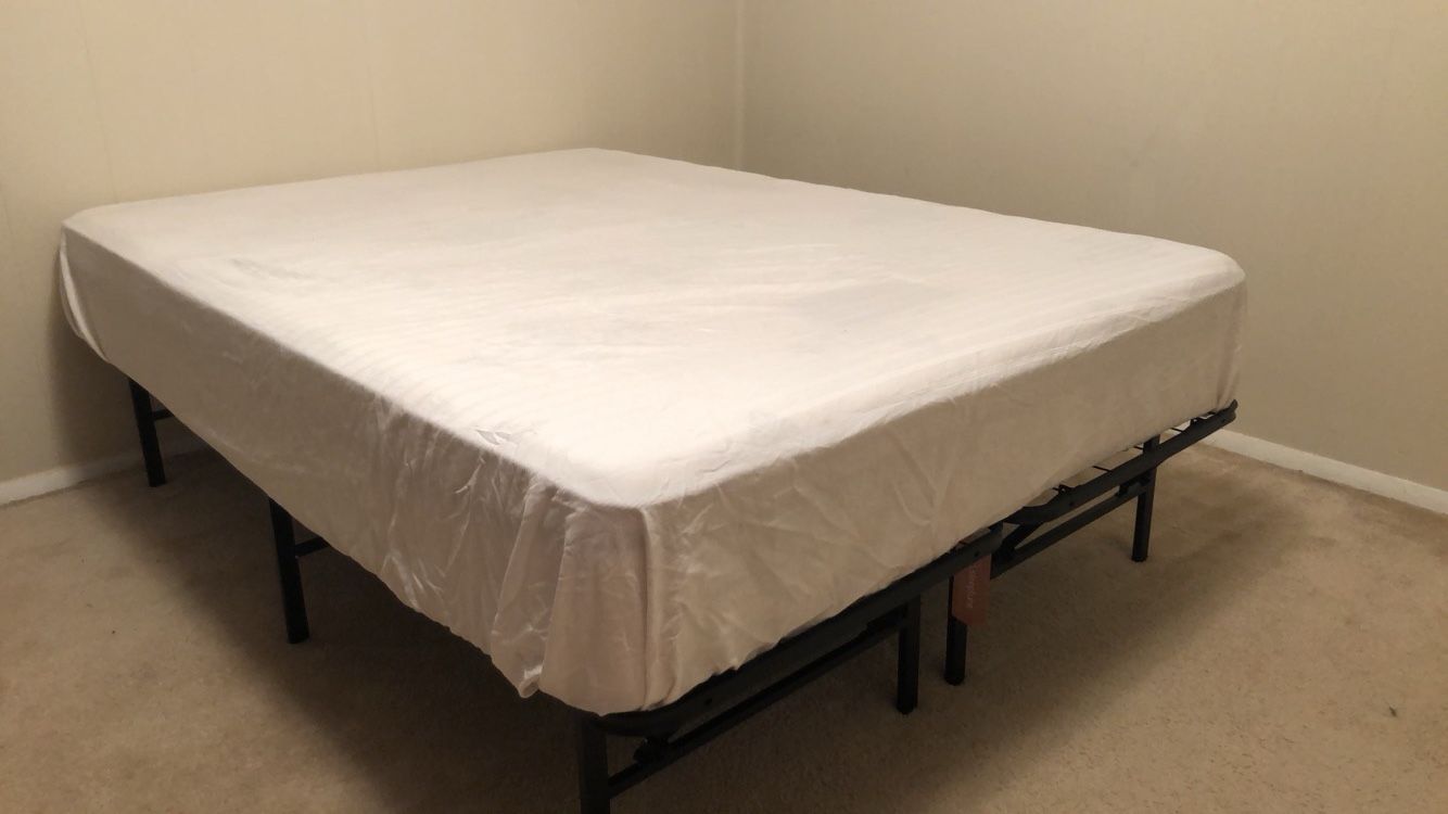 FULL sized mattress and bed frame. Both for $100!
