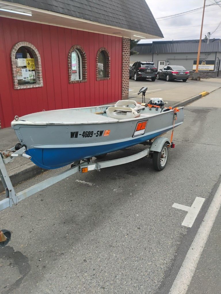 Boat And Trailer With Motor