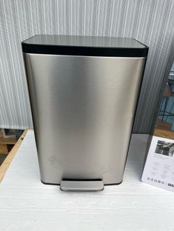 Like-New Kohler 47L Step Trash Can, with one cosmetic dent and some scuffs. See pics.