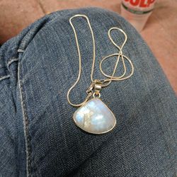 Moonstone pendant with silver necklace