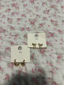 Bow and hoop gold earrings