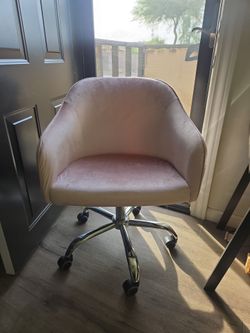 Pink rolling chair