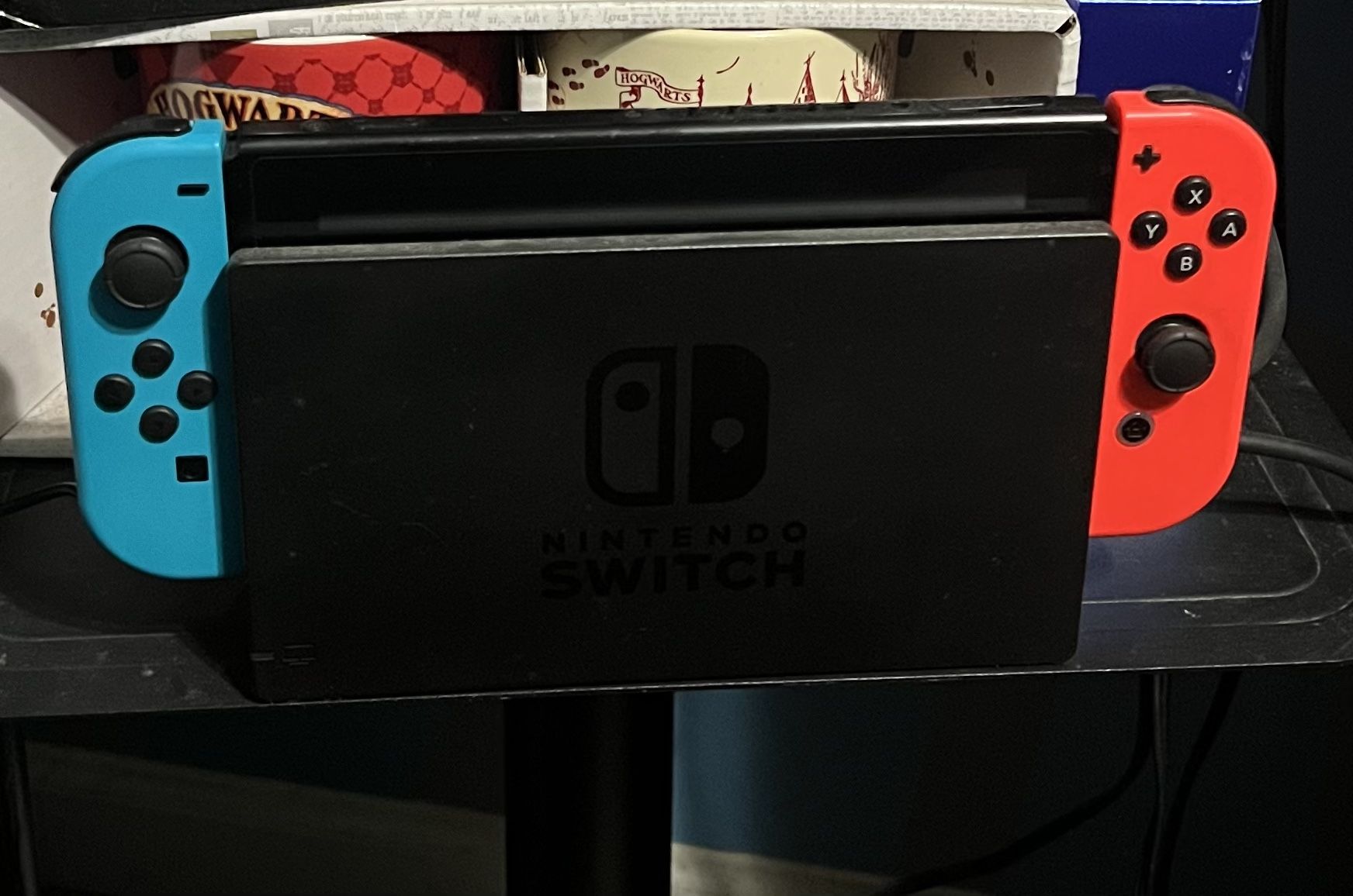 Nintendo Switch with Neon Blue and Neon Red Joy‑Con