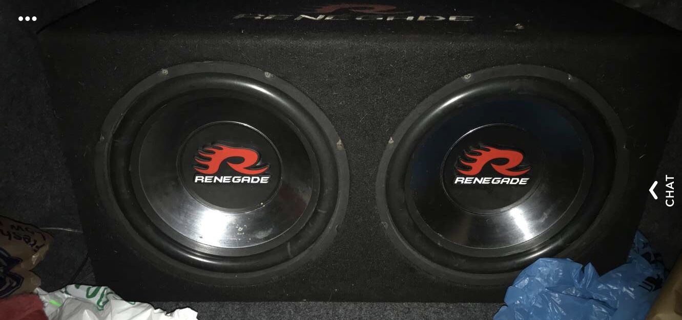 2 12 inch subs in box with amp