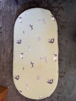Bassinet mattress with sheet