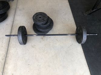 Weight lifting bar and weights