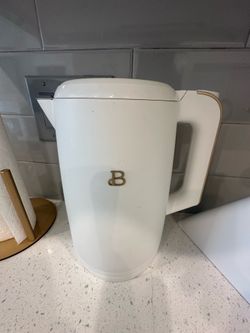 Drew Barrymore 1.7 liter electric kettle with one touch activation in white icing