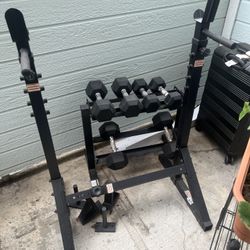 Squat rack, Dumbbells, and Stand