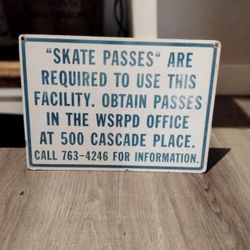 VINTAGE "SKATE PASSES" HEAVY METAL PAINTED SIGN. FROM THE "TAFT" CALIFORNIA AREA...ASKING $30.00