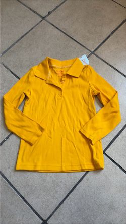Kids size 5 uniform shirt ( long sleeve) gold