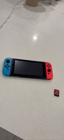 Nintendo Switch + Super Mario Odyssey + Charger - $220 OBO