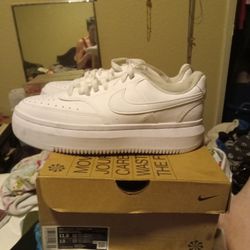 White Nike Air Force one.