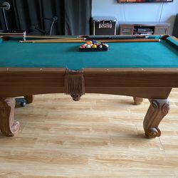 Pool Table With 5 Sticks And Wall Hanger And Balls
