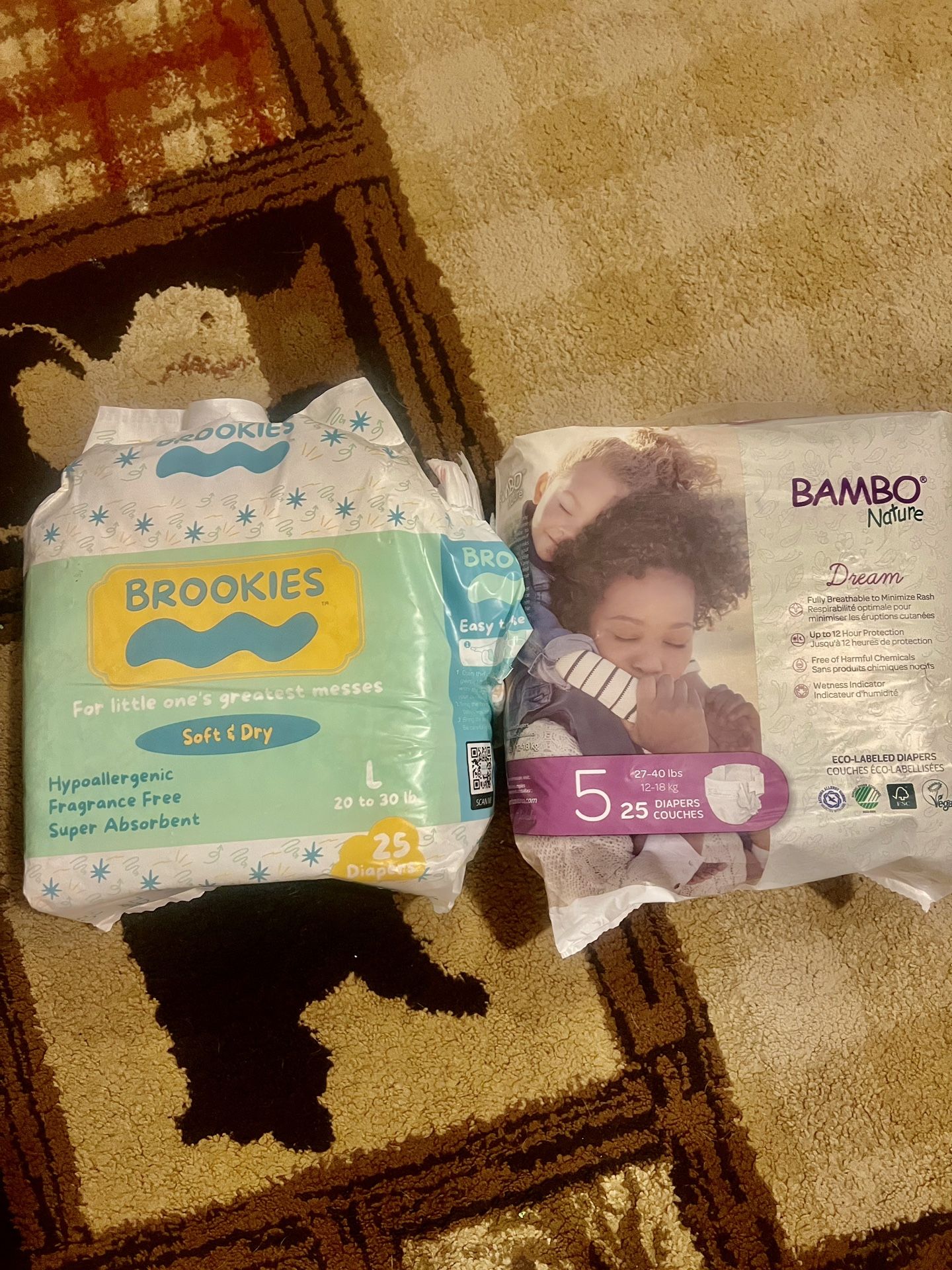 Two Packs Of Diapers Size 5 Open Box
