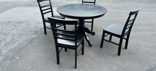 42”x42”x30”h solid wood table with four chairs