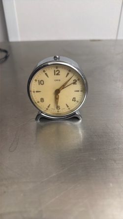 This vintage Oris Swiss-made mechanical alarm clock from circa the 1950s–1960s