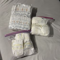 New Born Diapers (71 Diapers) Huggies & Pampers