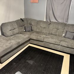 Grey couch with queen pull out