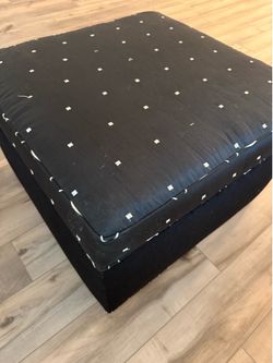 Large Rolling Fabric Ottoman with wheels and large matching pillow