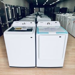 New Samsung 4.4 cu. ft. Top Load Washer with ActiveWave Agitator paired with a 7.2 cu. ft. Gas Dryer featuring Sensor Dry technology