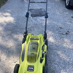 20” Ryobi Push mower grass stopper with battery and charger