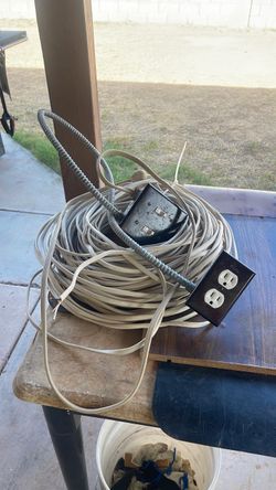14/2 N M - B in door electrical building wire. Over 50 feet Also used 2 gang electrical switch box.