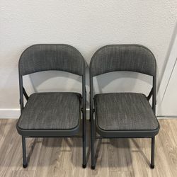 Two Cushioned Folding Chairs 