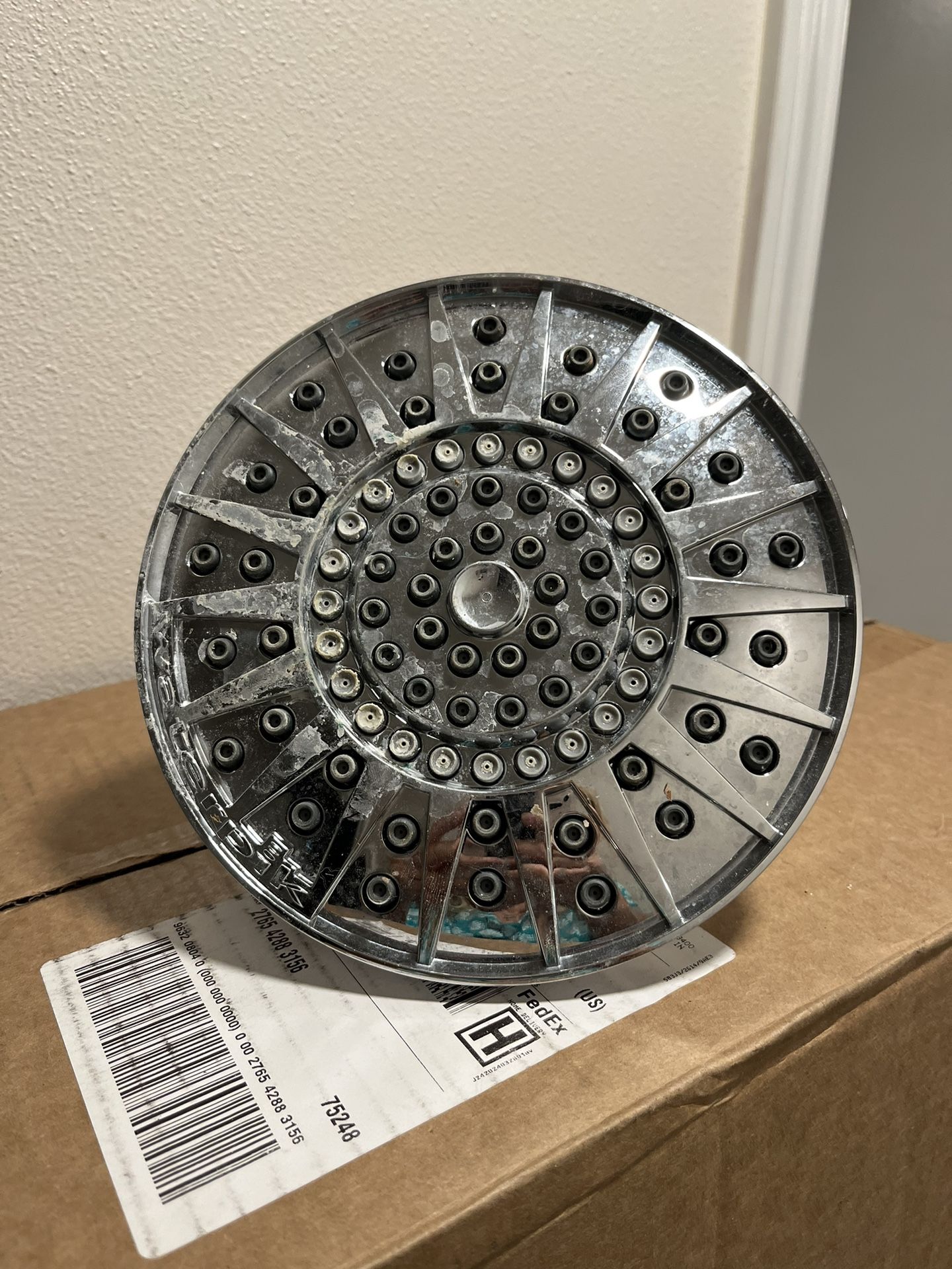 SHOWER HEAD; cross streets are Arapaho & Waterview