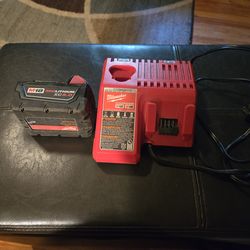 MILWAUKEE BATTERY AND CHARGER