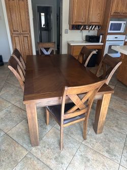 Expandable Dining Table + 8 Chairs – Extension Leaf Included
