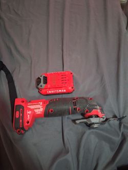 Craftsman V20 20V Max Oscillating Multi-Tool (CMCE500) with a Craftsman V20 2.0Ah Lithium-Ion battery.