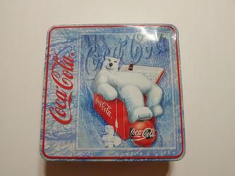 Coca Cola puzzle in metal tin sealed
