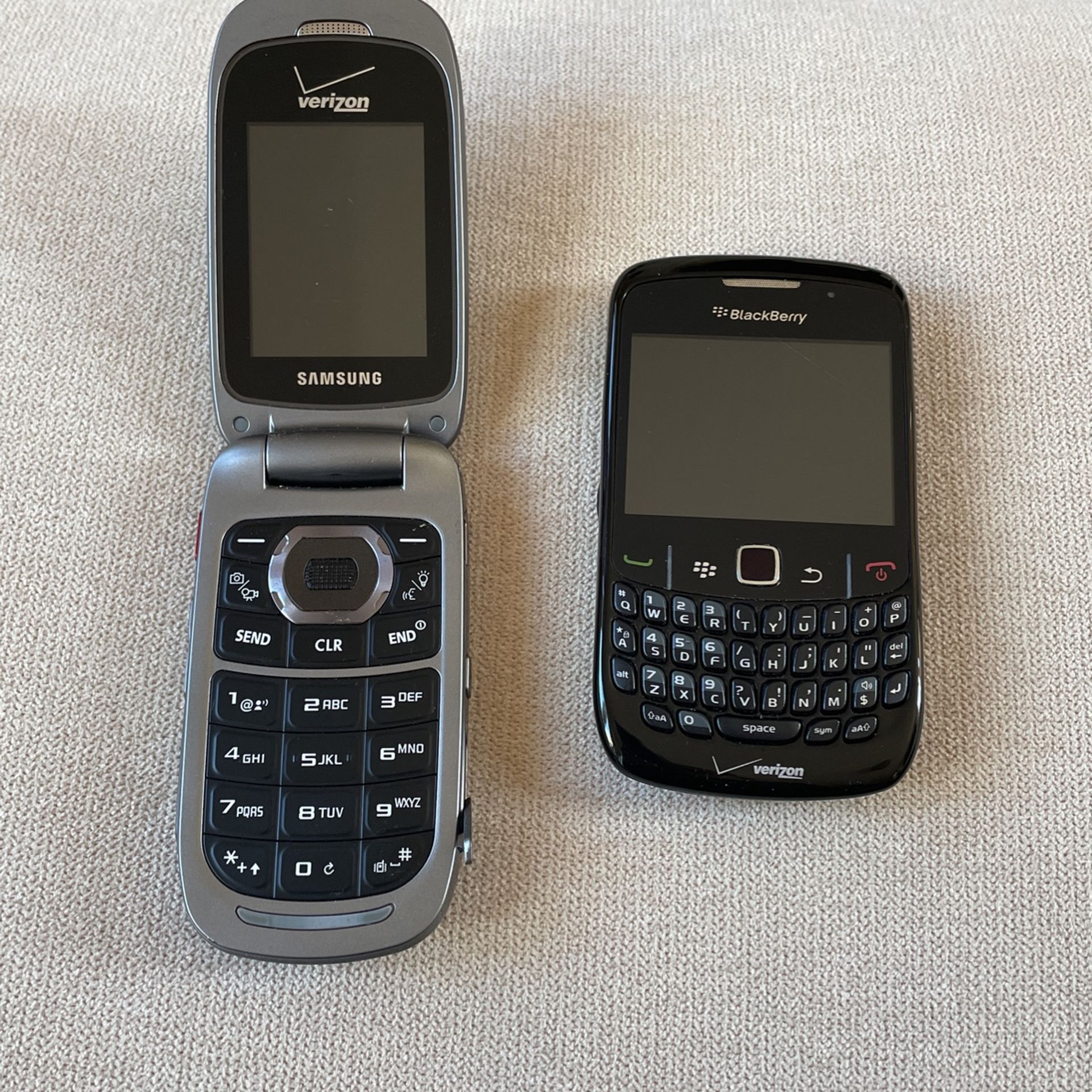 Old BlackBerry and Verizon flip phone