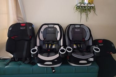 Two Graco car seats come with additional replacement $55 each.