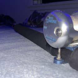 Accurate Boss Extreme BX-400 (and BX2-400) with cal star live bait and jigging rod