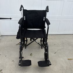 Light weight transport wheelchair
