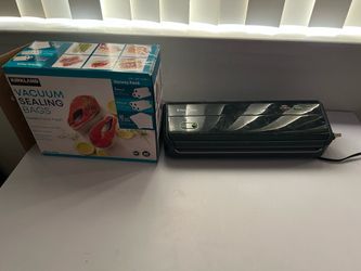 FoodSaver Vacuum Sealer Machine + Kirkland Signature Vacuum Seal Bag Rolls Set