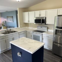 Epoxy Resin in your Countertop And Refinished Cabinets 