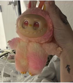 This is a Pop Mart The Monsters Big into Energy series vinyl plush doll in the "Loyalty" colorway.