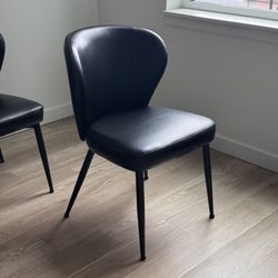 Two Black Leather Chairs ($20 ea.)