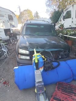 Damaged Chevrolet Tahoe/Silverado SUV for Parts
