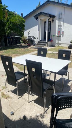 Five pieces Dining set four chairs and table nice style foldable table from each side  black and white color comfortable chairs clean table’s size L51