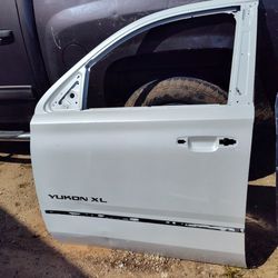 Driver Side Front Door For A 2015 To 22 GMC Yukon Or Tahoe / Suburban Doors Are The Same Original OEM Part