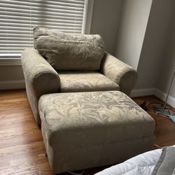 Comfortable Beige Chair With Ottoman