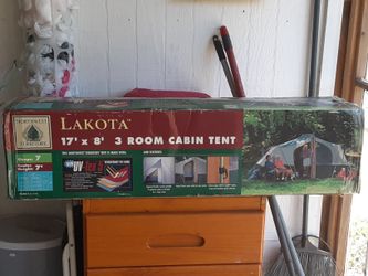 Cabin tent sleeps 7 people center height Cabin tent sleeps 7 people center height 7ft brand new in box never used worth $400.00 in store a OBO n