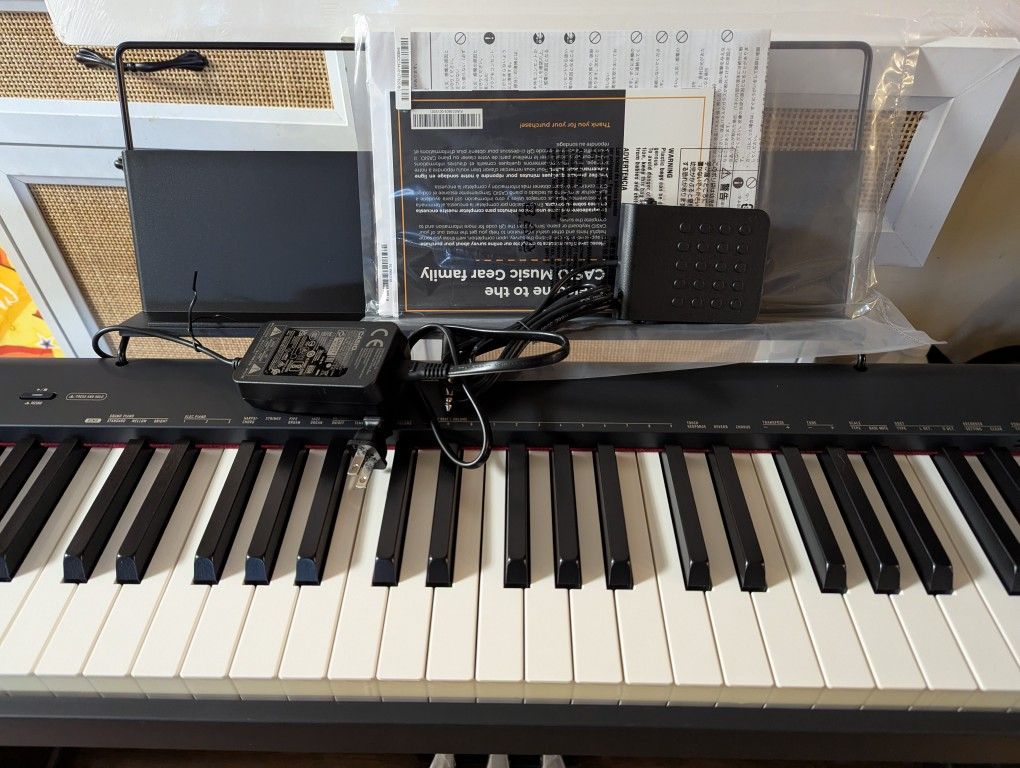 Casio Keyboard With Bench Brand New  Paid 700  There Is 52 Keys 