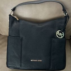 Black leather Michael Kors purse