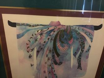 Was given this from my aunt who has passed .just to hard for me to see everyday needs to go to a wanting home . Not sure what print on here but very
